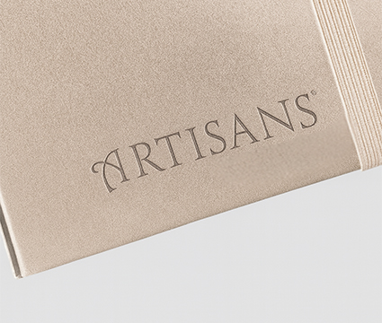 Debossed branding on a notebook cover